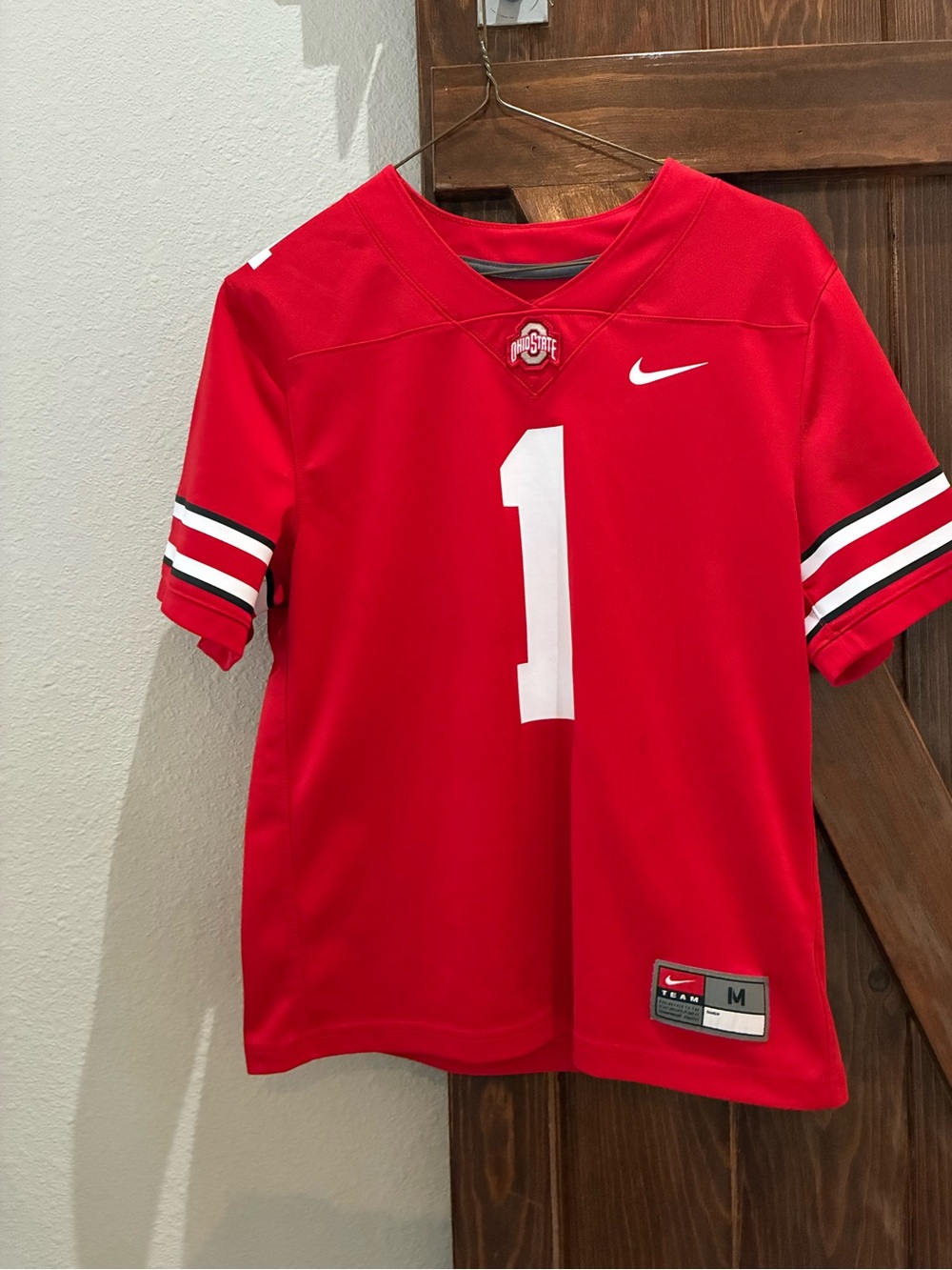 Nike Red Youth Football Jersey with White Number and Black-White Sleeve Stripes